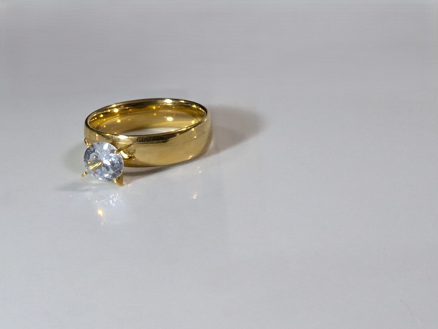 Engagement ring with large zircon in stainless steel