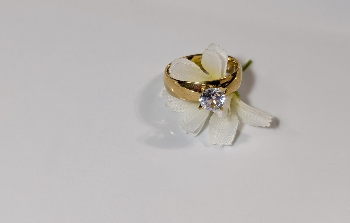 Engagement ring with large zircon in stainless steel