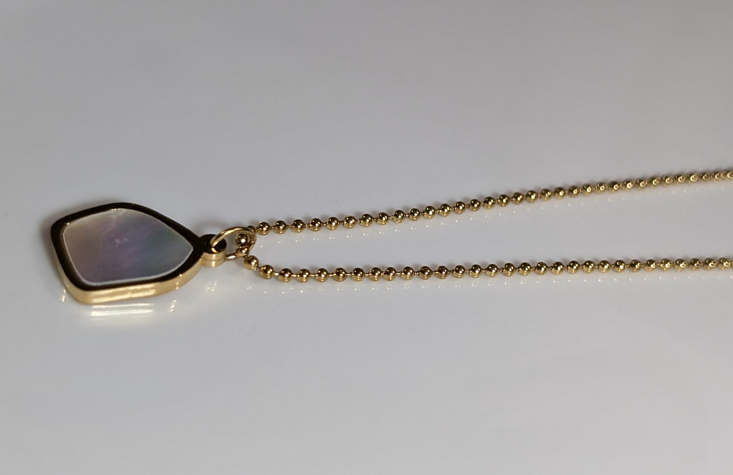 Collier pendentif en forme hexagonale en acier inoxydable plaqué Or 18K