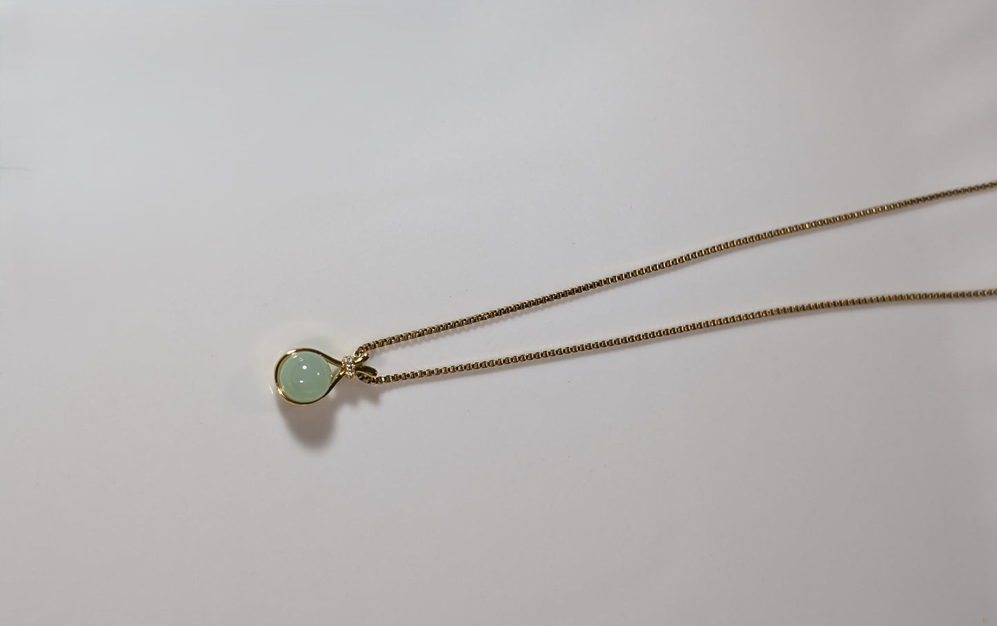 Collier avec pendentif perle bleue