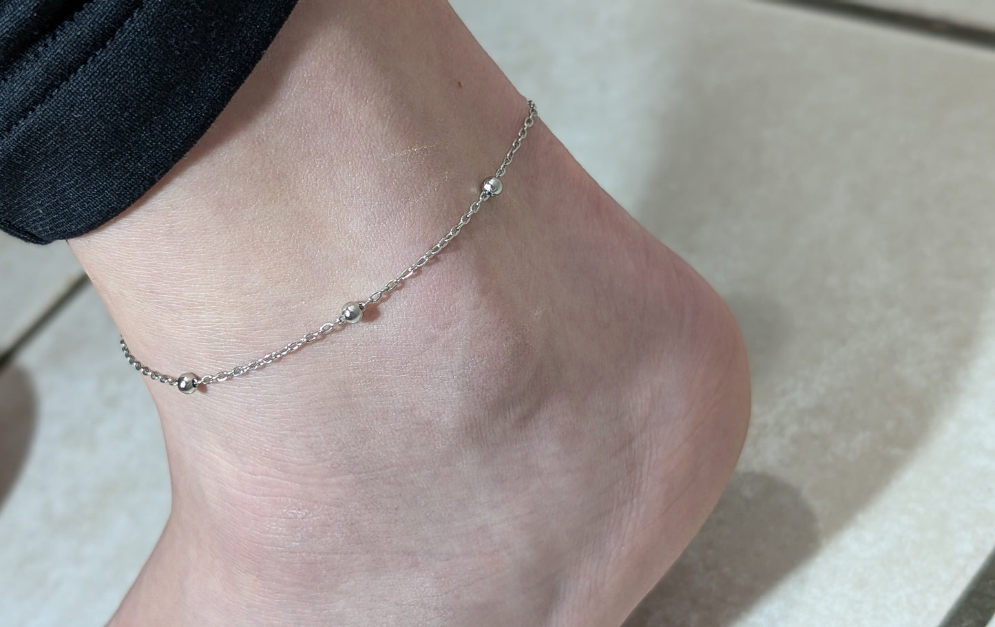 Bracelet pied boule argent en acier inoxydable