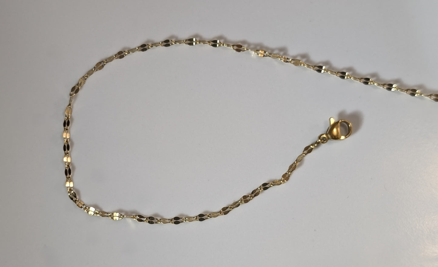 Chaîne cheville en forme de lèvre