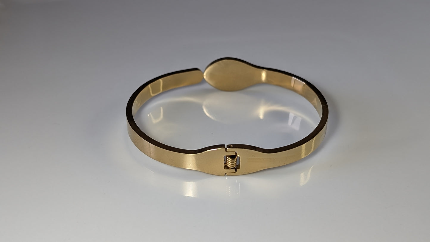 Rigid snake bracelet in 18K gold plated stainless steel