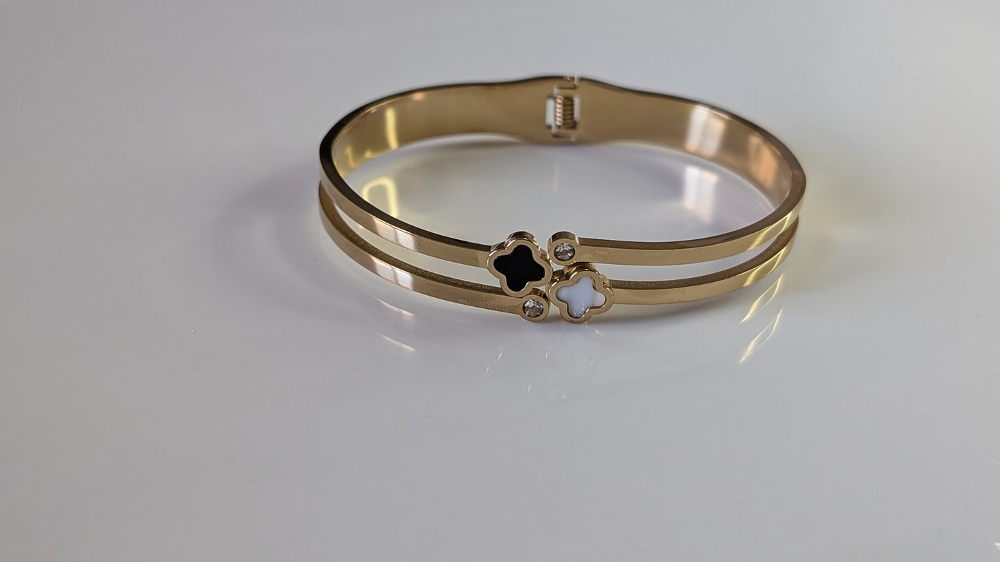 Bracelet rigide trèfles blanc et noir