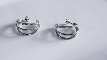 Three circle shaped earrings