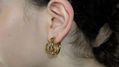 Three circle shaped earrings